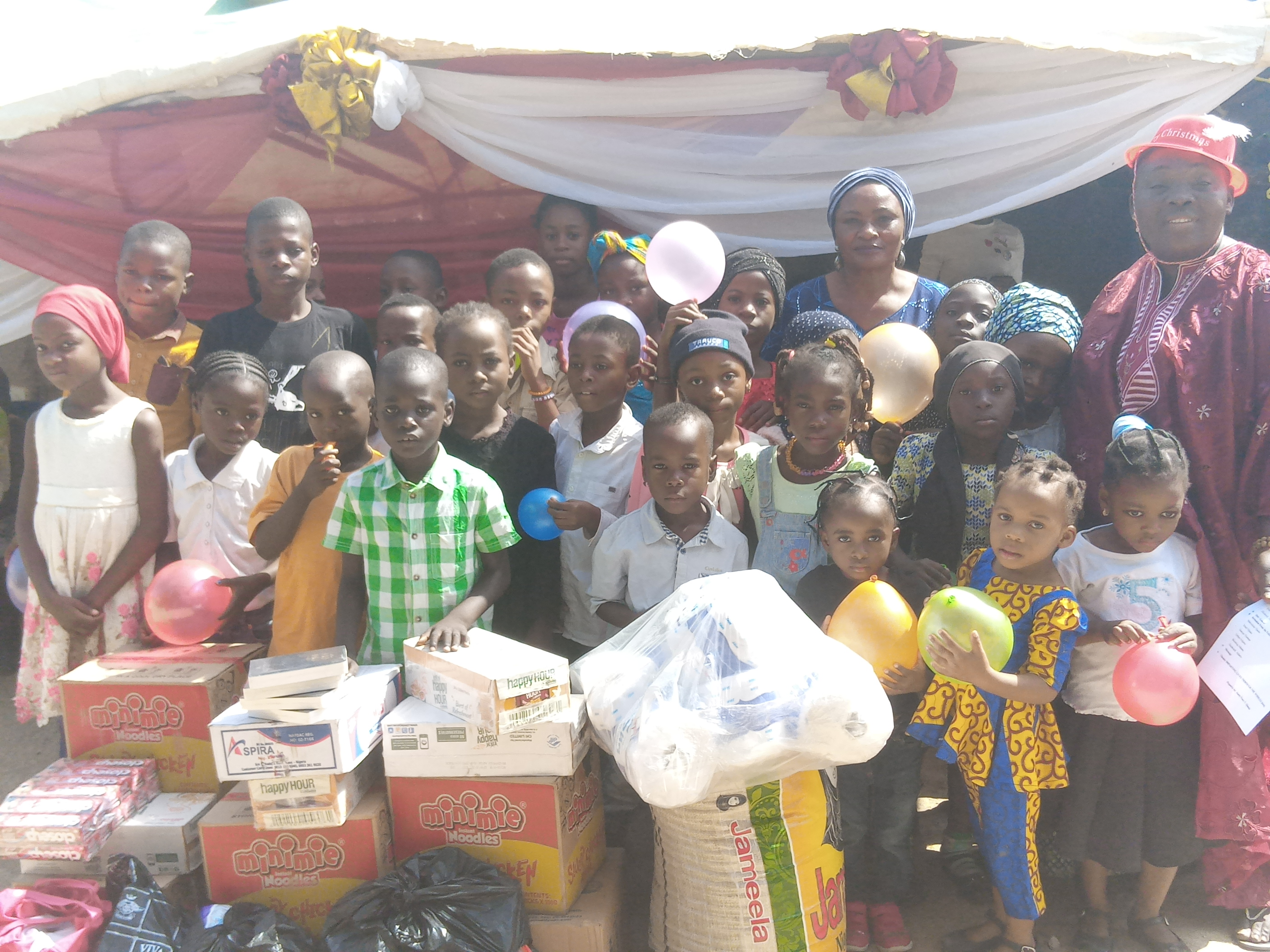 Children receiving meals at the orphanage
